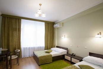 Спальня в номере двухместный улучшенный - санаторий имени Калинина в городе Ессентуки