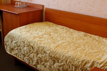 Спальня в одноместном однокомнатном номере второй категории - санаторий Лесная Поляна - город Пятигорск