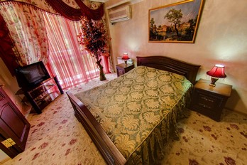 Спальная комната в двухместном президентском люксе - санаторий Пятигорский Нарзан в город-курорте Пятигорск