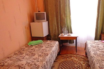 Спальная комната  в двухместном однокомнатном номере без удобств - санаторий Пятигорье - город Пятигорск