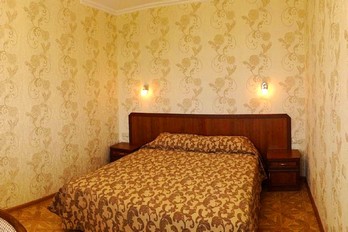 Спальня в номере люкс двухместный - санаторий Руно - город Пятигорск