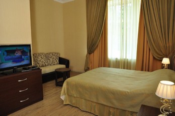 Спальня в номере двухместный люкс в корпусе Вилла Герман в городе Ессентуки