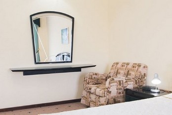 Кресло в номере комфорт двухместный однокомнатный - санаторий Долина нарзанов в городе Ессентуки