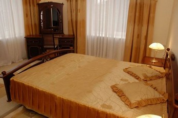 Спальня номера люкс в санатории клиника ФМБА города Ессентуки