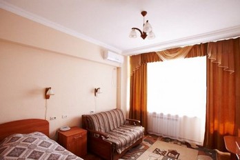 Спальня в номере одноместный стандарт - санаторий имени Калинина в город Ессентуки