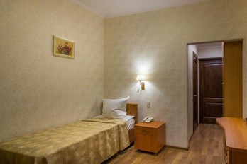 Спальня в номере улучшенный в санатории Москва - город Ессентуки