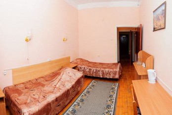 Спальня в номере двухместный второй категории в санатории Надежда в городе Ессентуки
