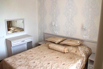 Спальня в номере семейный - санаторий Нива города Ессентуки