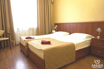 Спальня в номере двухместный Бизнес в центральном корпусе санатория Шахтёр в Ессентуках