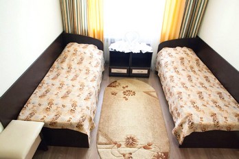Спальня двухместного однокомнатного номера - санаторий Юность в городе Ессентуки