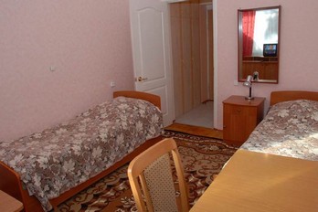 Спальня в номере двухместный однокомнатный - санатория Виктория в Ессентуках