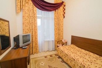 Спальня в одноместном номере - санаторий Воронеж в городе Ессентуки