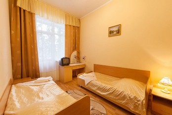 Спальня в номере семейный - санаторий Жемчужина Кавказа в городе Ессентуки
