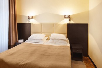 Спальня в номере малый двухместный четырехзвездочный в санатории Бештау - город Железноводск