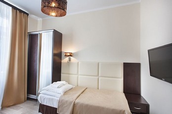 Спальня в номере двухместный улучшенный большая комната в санатории Бештау - город Железноводск