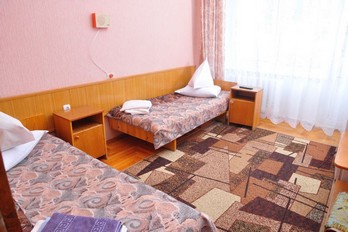 Кровать в номере двухместный третьей категории в санатории Дубрава в Железноводске
