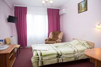 Спальня в номере одноместный первой категории - санаторий Эльбрус в городе Железноводск