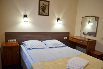 Спальня в номере люкс одноместный - санаторий Эльбрус города Железноводск