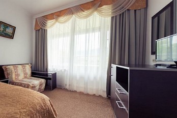 Спальня в однокомнатном одноместном номере - санаторий Горный Воздух в Железноводске