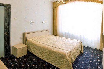 Спальная комната в номере двухместный люкс санатория Горный Воздух в Железноводске