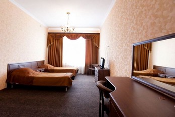 Спальня в номере двухместный однокомнатный полулюкс в санатории Кирова в городе Железноводск